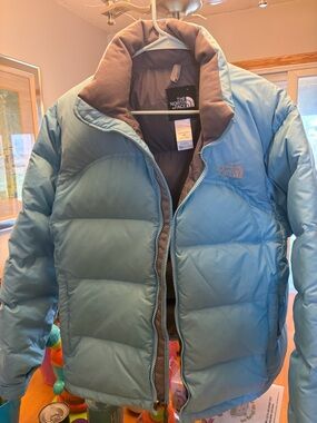 The North Face Sky Blue Down Puffer Jacket with 700 fill.  Size Large